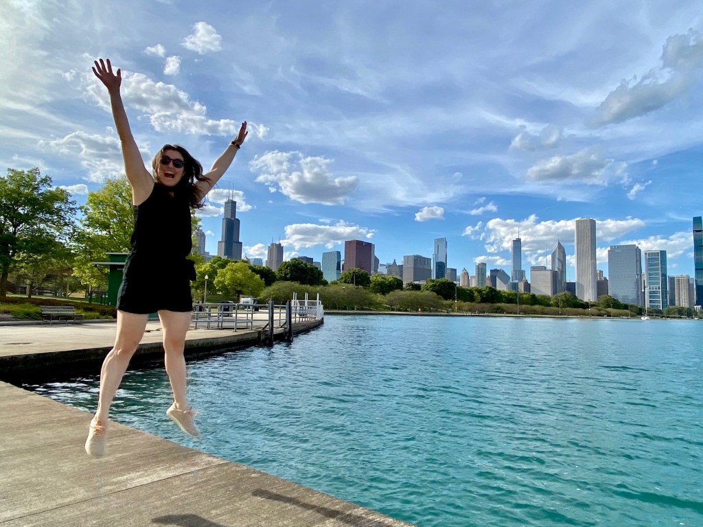 A classic skyline jumping photo outside the Shedd